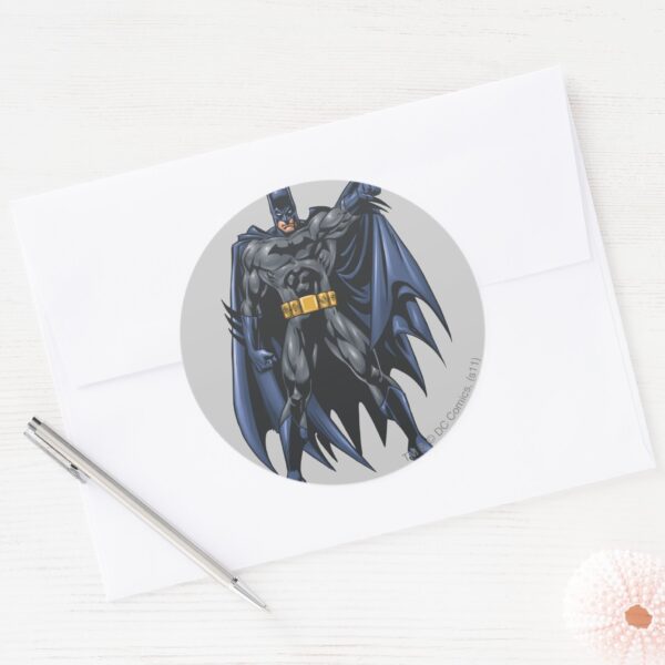 Batman_holds_up_cape_classic_round_sticker_3 Batman Holds Up Cape Classic Round Sticker
