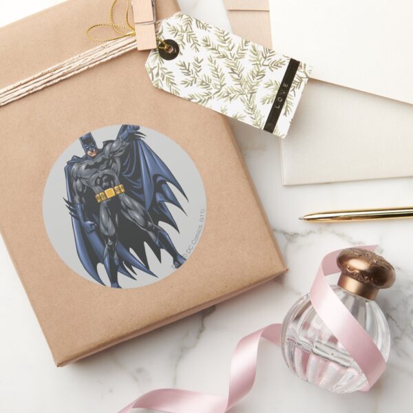 Batman_holds_up_cape_classic_round_sticker_5 Batman Holds Up Cape Classic Round Sticker