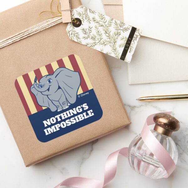 Dumbo___Cartoon_Dumbo_Holding_Up_Feather_Square_Sticker_5 Dumbo Cartoon Dumbo Holding Up Feather Square Sticker