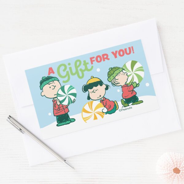 Peanuts___A_Gift_For_You_Rectangular_Sticker_3 Peanuts A Gift For You Rectangular Sticker