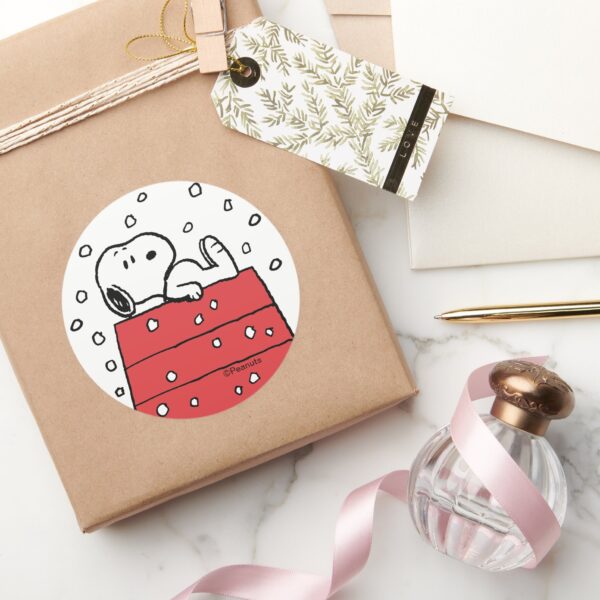 Peanuts___Snoopy_Doghouse_Snowflakes_Classic_Round_Sticker_5 Peanuts Snoopy Doghouse Snowflakes Classic Round Sticker