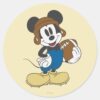 Sporty_Mickey___Holding_Football_Classic_Round_Sticker_1 Sporty Mickey Holding Football Classic Round Sticker