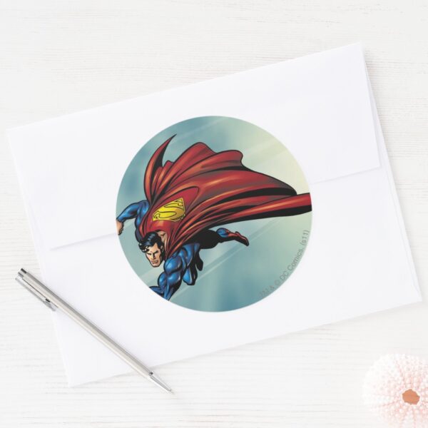 Superman_flys_with_cape_classic_round_sticker_3 Superman Flys With Cape Classic Round Sticker