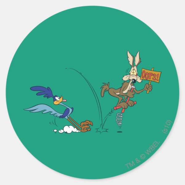 WILE_E._COYOTE™_and_ROAD_RUNNER™_Pogo_Stick_Classic_Round_Sticker_1 WILE E. COYOTE™ And ROAD RUNNER™ Pogo Stick Classic Round Sticker